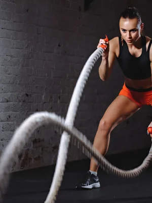 girls doing cross training exercise with rope